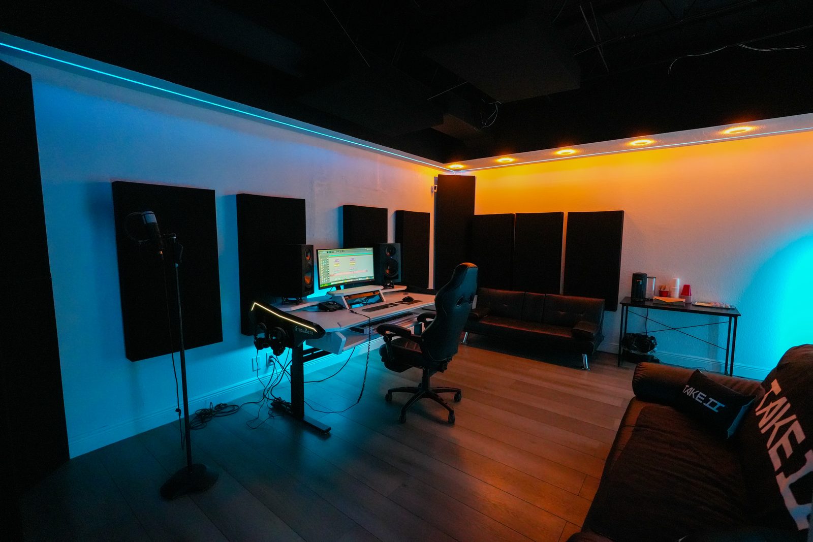 TakeTwo Media recording studio with professional equipment and mood lighting